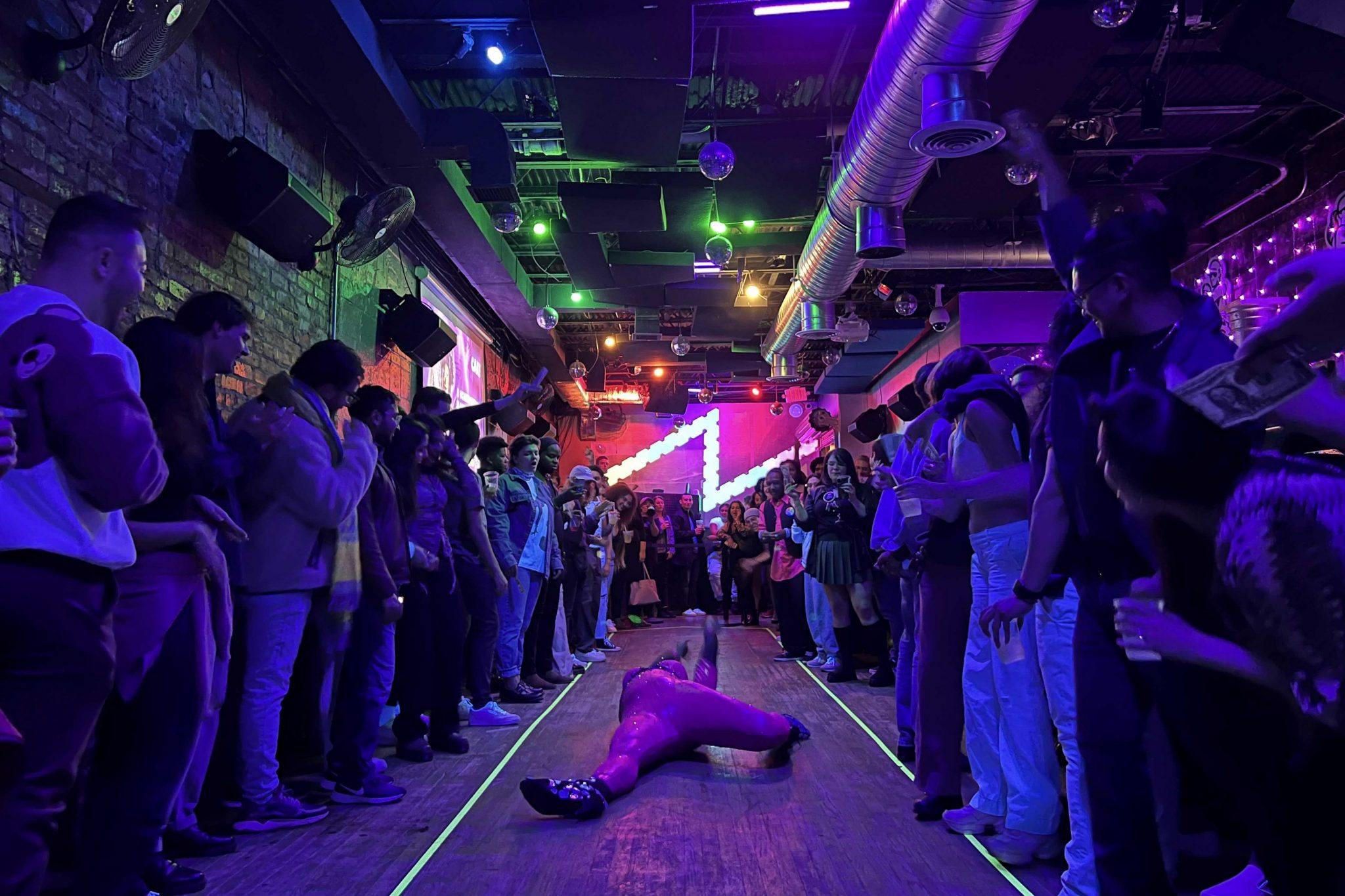 Lesbian bar in DC brings queer people together with fun, comedy and performances photo image
